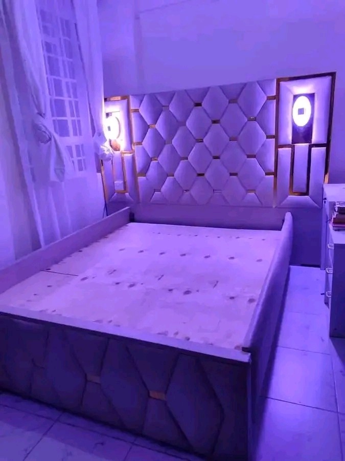 Headboard lights bed